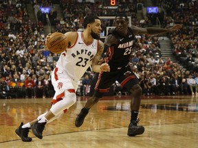 Toronto Raptors Fred VanVleet PG goes around the outside on Miami Heat Kendrick Nunn SG during the first half in Toronto, Ont. on Tuesday December 3, 2019.