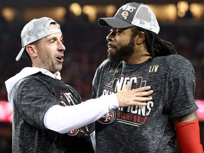 Head coach Kyle Shanahan of the San Francisco 49ers celebrates with Richard Sherman after winning the NFC Championship game against the Green Bay Packers at Levi's Stadium on January 19, 2020 in Santa Clara. (Ezra Shaw/Getty Images)