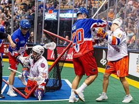 Toronto Rock’s Brad Kri (No. 20) gets into it with the Halifax Thunderbirds last night during a 12-9 win. (Ryan McCullogh photo)