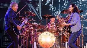 Alex Lifeson, Neil Peart and Geddy Lee of Rush performing at RBC Bluesfest in Ottawa. July 8,2013. (Errol McGihon/Sun files)