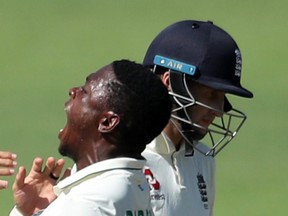 South Africa’s Kagiso Rabada celebrates after taking the wicket of England’s Joe Root during a cricket Test match on Jan. 16, 2020 at Port Elizabeth, South Africa. (SIPHIWE SIBEKO/Reuters)