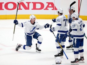 Lightning forward Steven Stamkos, left, celebrates after scoring a goal against the Stars in the third period at American Airlines Center in Dallas, on Monday, Jan. 27, 2020.