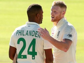 England's Ben Stokes (right) talks with South Africa's Vernon Philander at the end of the second cricket Test in Cape Town on Jan. 7, 2020. (MIKE HUTCHINGS/Reuters)