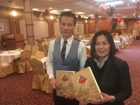 Bill Wong and Grace Yau inside an empty Summit Garden restaurant in Mississauga