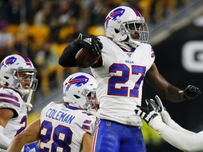 Bills cornerback Tre'Davious White (27) celebrates with teammates after intercepting a pass against the Steelers during first quarter NFL action at Heinz Field in Pittsburgh, on Dec. 15, 2019.