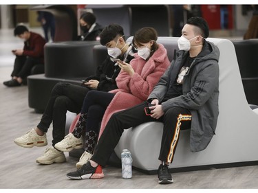 Flights arrive from three Chinese destinations at Pearson International Airport's Terminal 3 from Beijing, Shanghai and Chongqing. Over a 1,000 passengers arrived, the majority wearing masks as the Coronoavirus that has originated in Wuhan on Monday January 27, 2020. Jack Boland/Toronto Sun/Postmedia Network