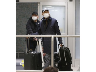 Flights arrive from three Chinese destinations at Pearson International Airport's Terminal 3 from Beijing, Shanghai and Chongqing. Over a 1,000 passengers arrived, the majority wearing masks as protection from the Coronoavirus that has originated in Wuhan on Monday January 27, 2020. Jack Boland/Toronto Sun/Postmedia Network