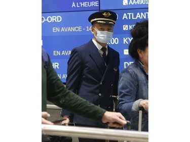 Flights arrive from three Chinese destinations at Pearson International Airport's Terminal 3 from Beijing, Shanghai and Chongqing. Over a 1,000 passengers arrived, the majority wearing masks as protection from the Coronoavirus that has originated in Wuhan on Monday January 27, 2020. Jack Boland/Toronto Sun/Postmedia Network