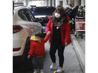 Flights arrive from three Chinese destinations at Pearson International Airport's Terminal 3 from Beijing, Shanghai and Chongqing. Over a 1,000 passengers arrived, the majority wearing masks as protection from the Coronoavirus that has originated in Wuhan on Monday January 27, 2020. Jack Boland/Toronto Sun/Postmedia Network