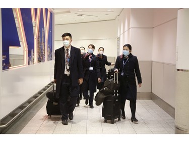 Flights arrive from three Chinese destinations at Pearson International Airport's Terminal 3 from Beijing, Shanghai and Chongqing. Over a 1,000 passengers arrived, the majority wearing masks as protection from the Coronoavirus that has originated in Wuhan on Monday January 27, 2020. Jack Boland/Toronto Sun/Postmedia Network