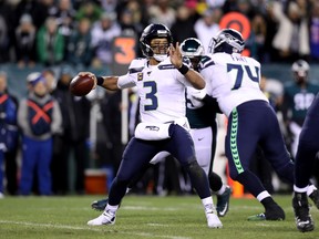 Quarterback Russell Wilson and the Seattle Seahawks head to Lambeau Field on Sunday to take on the Green Bay Packers. (Rob Carr/Getty Images)