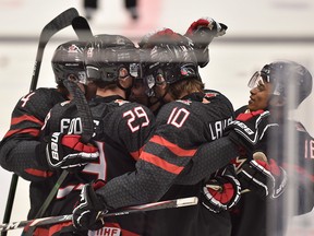 Canada players celebrate their second goal during the 2020 IIHF World Junior Ice Hockey Championships Group B match between Canada and Czech Republic in Ostrava, Czech Republic, on Dec. 31, 2019.