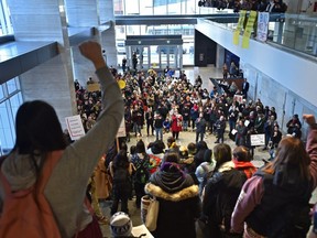 Loud but peaceful protesters occupy the lobby of the Enbridge Centre building in downtown Edmonton on Feb. 10, 2020, in solidarity with the Wet’suwet’en Nation. (Postmedia Network)