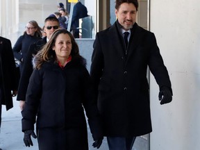 Prime Minister Justin Trudeau and Deputy Prime Minister Chrystia Freeland arrive to speak to news media in Ottawa on Feb. 21, 2020. (Reuters)