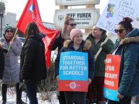 Striking elementary school teachers in St. Thomas protest Monday afternoon outside of the office of PC MPP Jeff Yurek. (Postmedia Network)