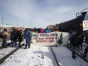 CP-Web. Protestors blockade the rail line at Macmillan Yard in Toronto on  Feb. 15, 2020. (The Canadian Press)