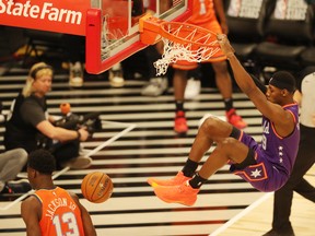 Team World forward RJ Barrett dunks the ball during Friday's NBA Rising Stars game. (USA TODAY SPORTS)