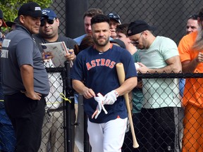 Houston Astros infielder Jose Altuve gets ready for a spring training workout. (USA TODAY SPORTS)