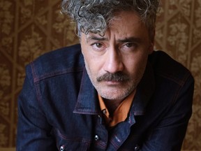 This Sept. 8, 2019 photo shows writer-director-actor Taika Waititi posing for a portrait to promote his film, "Jojo Rabbit," at the Fairmont Royal York Hotel during the Toronto International Film Festival. (Chris Pizzello/Invision/AP)