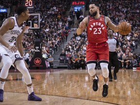 Toronto Raptors guard Fred VanVleet, left, controls a ball as Brooklyn Nets guard Spencer Dinwiddie defends during the first quarter at Scotiabank Arena in Toronto, Feb. 8, 2020. (Nick Turchiaro-USA TODAY Sports)