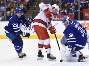 Maple Leafs goaltender Frederik Andersen makes a save on Carolina Hurricanes winger Erik Haula on Saturday night at Scotiabank Arena. (Frank Gunn/The Canadian Press)