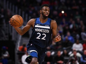 Minnesota Timberwolves guard Andrew Wiggins (22) brings the ball up court during the first quarter against the Detroit Pistons at Little Caesars Arena. Tim Fuller-USA TODAY