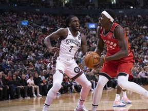 Raptors forward Pascal Siakam (right) controls a ball as Nets forward Taurean Prince defends at Scotiabank Arena last night.  Nick Turchiaro/USA TODAY Sports