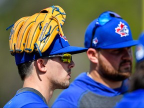 Blue Jays second baseman Cavan Biggio (left) watches the proceedings with Rowdy Tellez during spring training at Spectrum Field yesterday. Douglas DeFelice-USA TODAY Sports