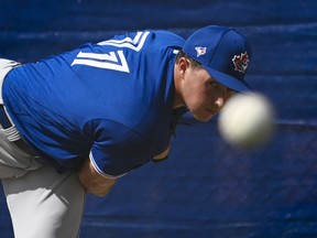 Toronto Blue Jays pitcher Nate Pearson (71) warms up during spring training at Spectrum Field. Mandatory Credit: Douglas DeFelice-USA TODAY Sports