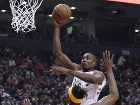 Toronto Raptors centre Serge Ibaka (9) drives to the basket over Indiana Pacers centre Myles Turner (33) during the first quarter at Scotiabank Arena. Nick Turchiaro-USA TODAY