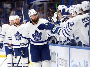 Jake Muzzin is congratulated after scoring a goal against the Tampa Bay Lightning during the first period at Amalie Arena.