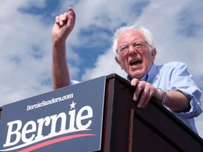 Democratic presidential hopeful Vermont Senator Bernie Sanders gestures as he speaks during a rally at Valley High School in Santa Ana, California, February 21, 2020.