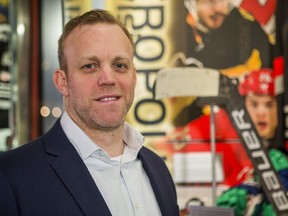 David Ayres at the Hockey Hall of Fame in Toronto, Ont. on Friday, Feb. 28, 2020. Hockey Hall of Fame added the stick (in background) used by Ayres as an emergency backup goalie in the game between Toronto Maple Leafs and the Carolina Hurricanes on Feb. 22, 2020. (Ernest Doroszuk/Toronto Sun/Postmedia Network)