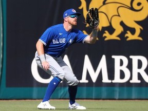 Toronto Blue Jays left fielder Derek Fisher (23) catches a fly ball during the fifth inning against the Minnesota Twins at CenturyLink Sports Complex.