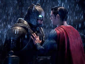 This image released by Warner Bros. Pictures shows Ben Affleck, left, and Henry Cavill in a scene from, “Batman v Superman: Dawn of Justice.” (Clay Enos/Warner Bros. Pictures)