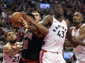 Toronto Raptors forward Pascal Siakam (43) battles for a rebound with Chicago Bulls forward Thaddeus Young (21) at Scotiabank Arena. (Dan Hamilton-USA TODAY Sports)