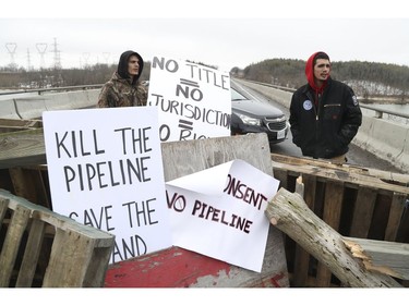 Native protestors block two ends of Hwy 6 in Caledonia in support of the Wet-suwet'en pipeline dispute and the OPP removal of the blockade in Belleville on Monday  on Tuesday February 25, 2020. Jack Boland/Toronto Sun/Postmedia Network