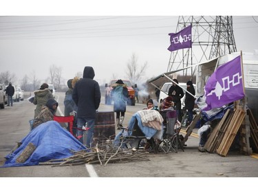 Supporters bring in pizzas to Native protestors block two ends of Hwy 6 in Caledonia in support of the Wet-suwet'en pipeline dispute and the OPP removal of the blockade in Belleville on Monday  on Tuesday February 25, 2020. Jack Boland/Toronto Sun/Postmedia Network