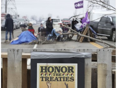 Native protestors block two ends of Hwy 6 in Caledonia in support of the Wet-suwet'en pipeline dispute and the OPP removal of the blockade in Belleville on Monday  on Tuesday February 25, 2020. Jack Boland/Toronto Sun/Postmedia Network
