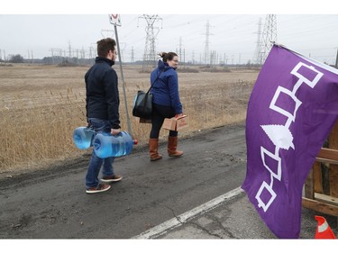 Native protestors block two ends of Hwy 6 in Caledonia in support of the Wet-suwet'en pipeline dispute and the OPP removal of the blockade in Belleville on Monday  on Tuesday February 25, 2020. Jack Boland/Toronto Sun/Postmedia Network