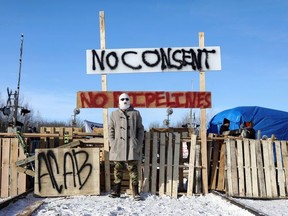 Supporters of the indigenous Wet'suwet'en Nation's hereditary chiefs camp at a railway blockade as part of protests against British Columbia's Coastal GasLink pipeline, in Edmonton, Alberta, Canada February 19, 2020.