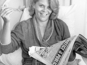 Christie Blatchford reading the Sunday Sun.