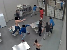 CCTV images show inmates at Edmonton Institution throwing food at "protected status" inmates, which Canada's correctional investigator alleges was done with staff collusion.