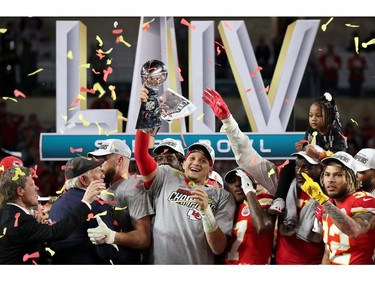 Kansas City Chiefs' Patrick Mahomes celebrates with the Vince Lombardi trophy after winning the Super Bowl LIV.