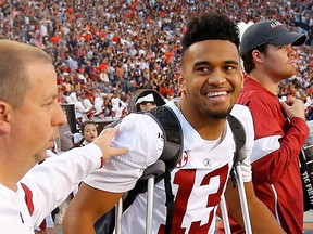 Tua Tagovailoa of the Alabama Crimson Tide stands on the sidelines during the final seconds of the first half against the Auburn Tigers at Jordan Hare Stadium on Nov. 30, 2019 in Auburn, Ala. (Kevin C. Cox/Getty Images)