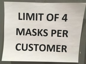 A sign posted on a major retailer last Friday indicated a limit on the number of masks able to be purchased. There was also a limit on hand sanitizers.  ANTONELLA ARTUSO/Toronto Sun