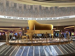 Elvis Presley's 24-karat gold leaf grand piano makes a statement in the entrance of the expansion to the Seminole Hard Rock Hotel and Casino Tampa.  (Cynthia McLeod/Toronto Sun)