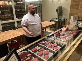 Walter Apfelbaum, executive butcher at Seminole Hard Rock Hotel & Casino Tampa, talks meat at Council Oak Steaks and Seafood. Behind him is the Himalayan rock salt dry-aging room. (Cynthia McLeod/Toronto Sun)