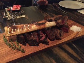 A USDA prime dry-aged tomahawk ribeye makes a statement at Council Oak Steaks and Seafood. (Cynthia McLeod/Toronto Sun)