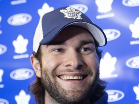 New Leafs goaltender Jack Campbell flashes a grin as he meets with reporters yesterday. He could get a chance to flash some leather as early as Friday in Toronto. (STAN BEHAL/TORONTO SUN)